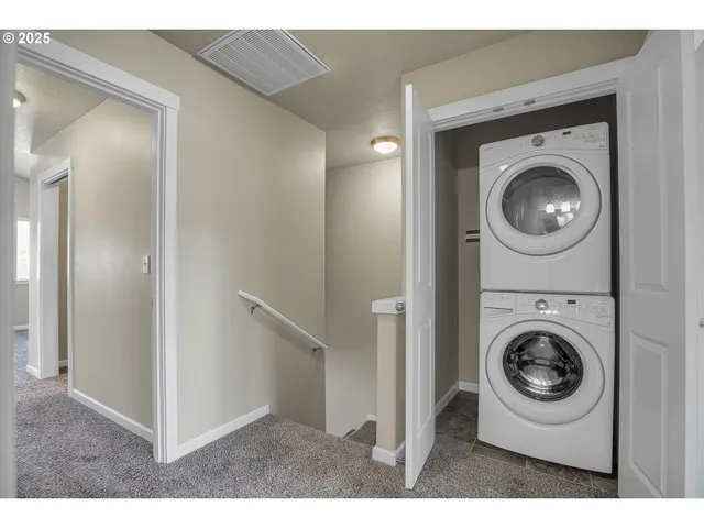 a view of washer and dryer in a utility room