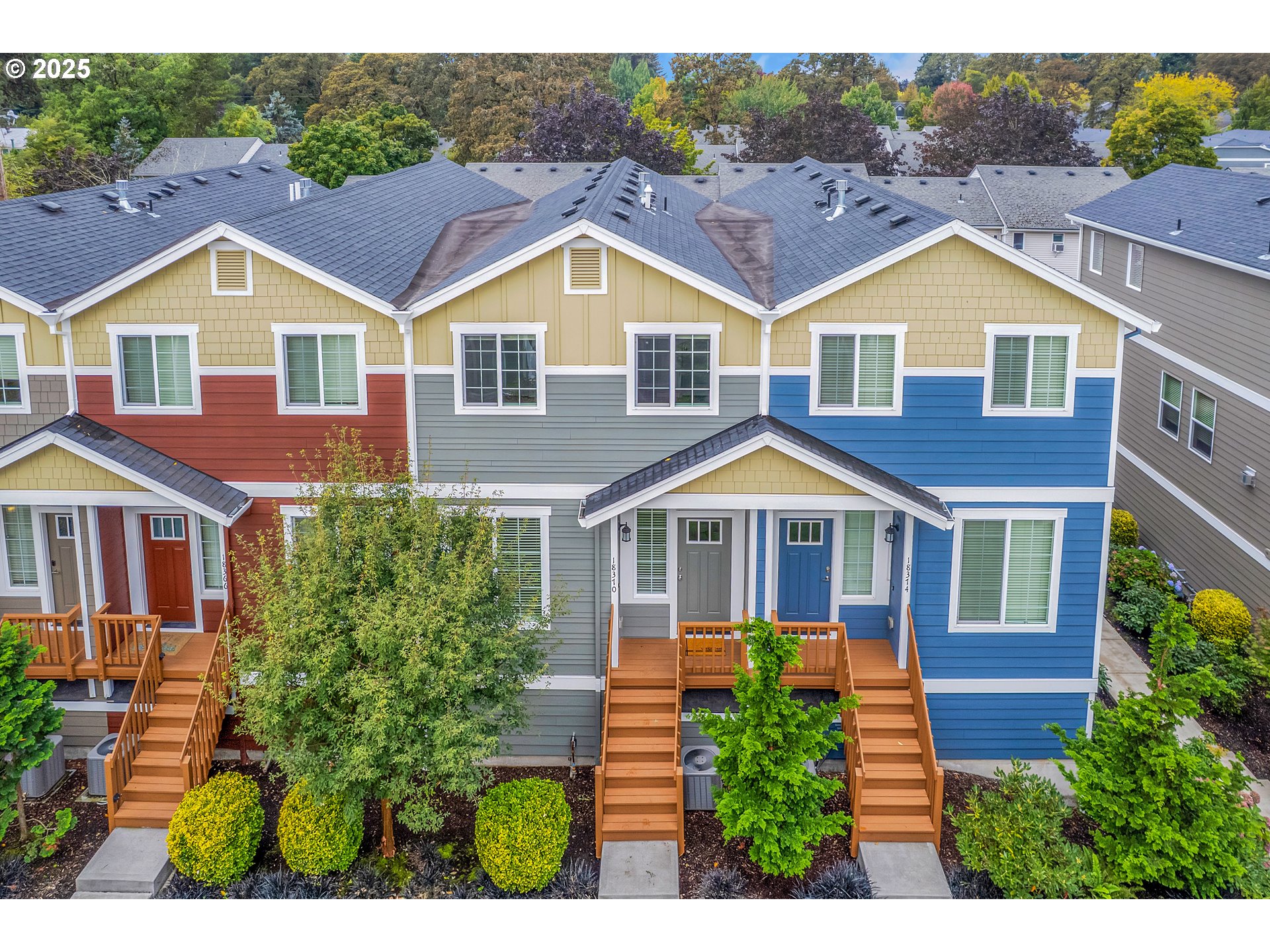 18370 Southwest Anna Mae Lane Beaverton, OR 97003 - Photo 28 of 29 a view of a yard in front of a brick house with a small yard