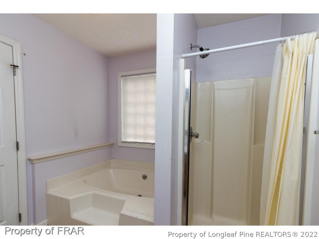 1941-3 Sardonyx Road Fayetteville, NC 28303 - Photo 17 of 27 a bathroom with a shower