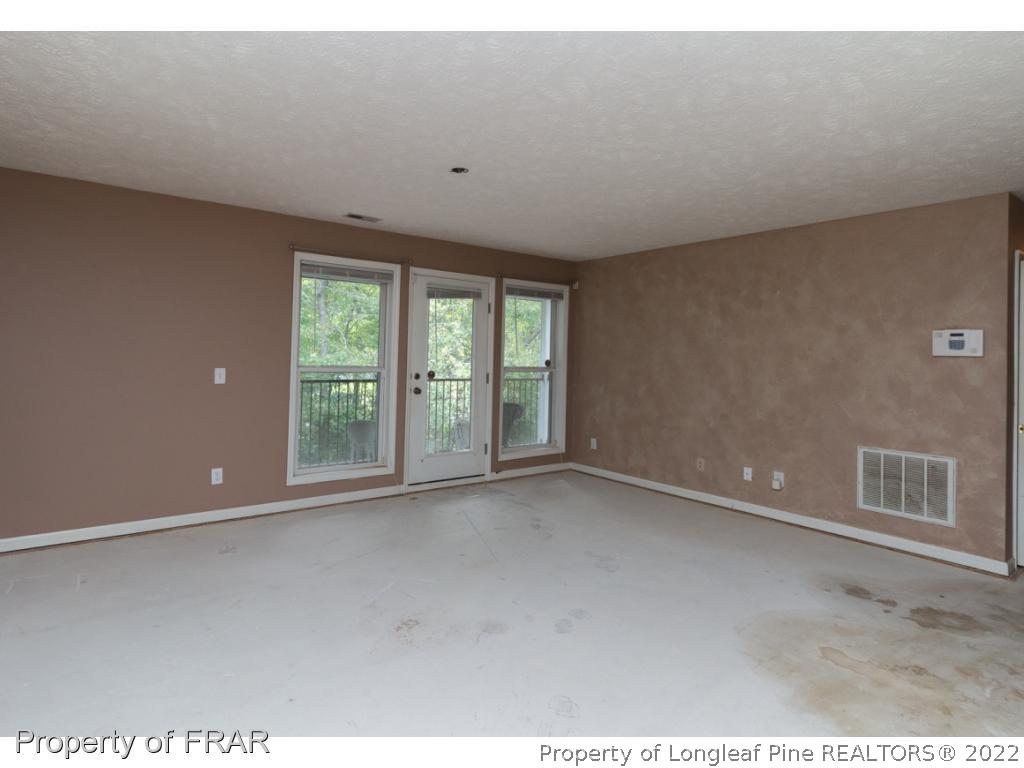 1941-3 Sardonyx Road Fayetteville, NC 28303 - Photo 4 of 27 a view of an empty room with a window