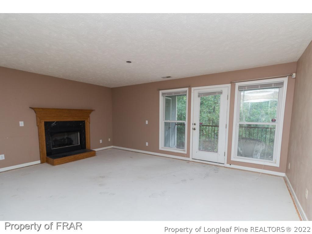1941-3 Sardonyx Road Fayetteville, NC 28303 - Photo 6 of 27 a view of an empty room with a window