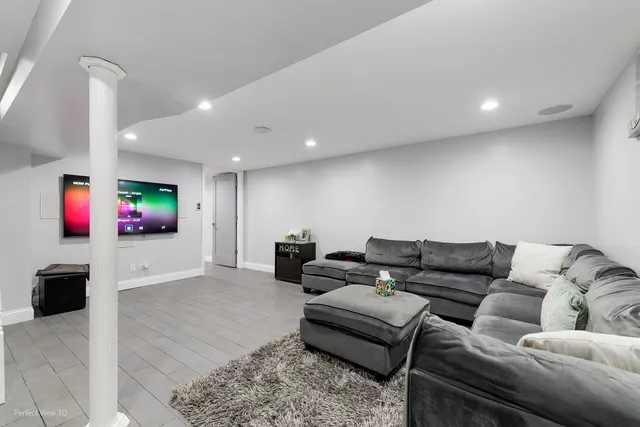 a living room with furniture and a couch