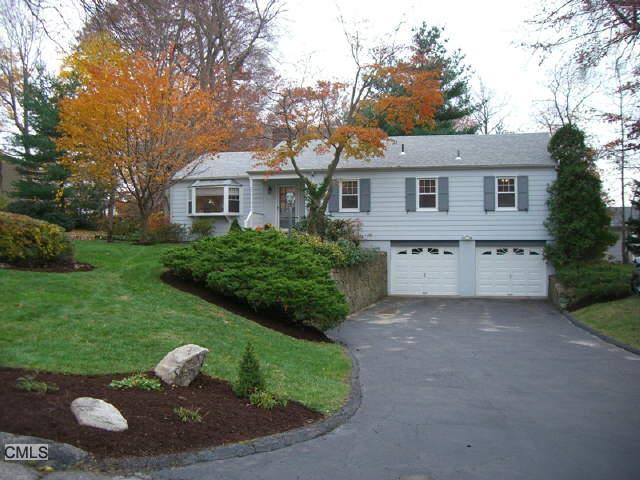 3 Redwood Road Norwalk, CT 06851 - Photo 1 of 1 a house view with a garden space
