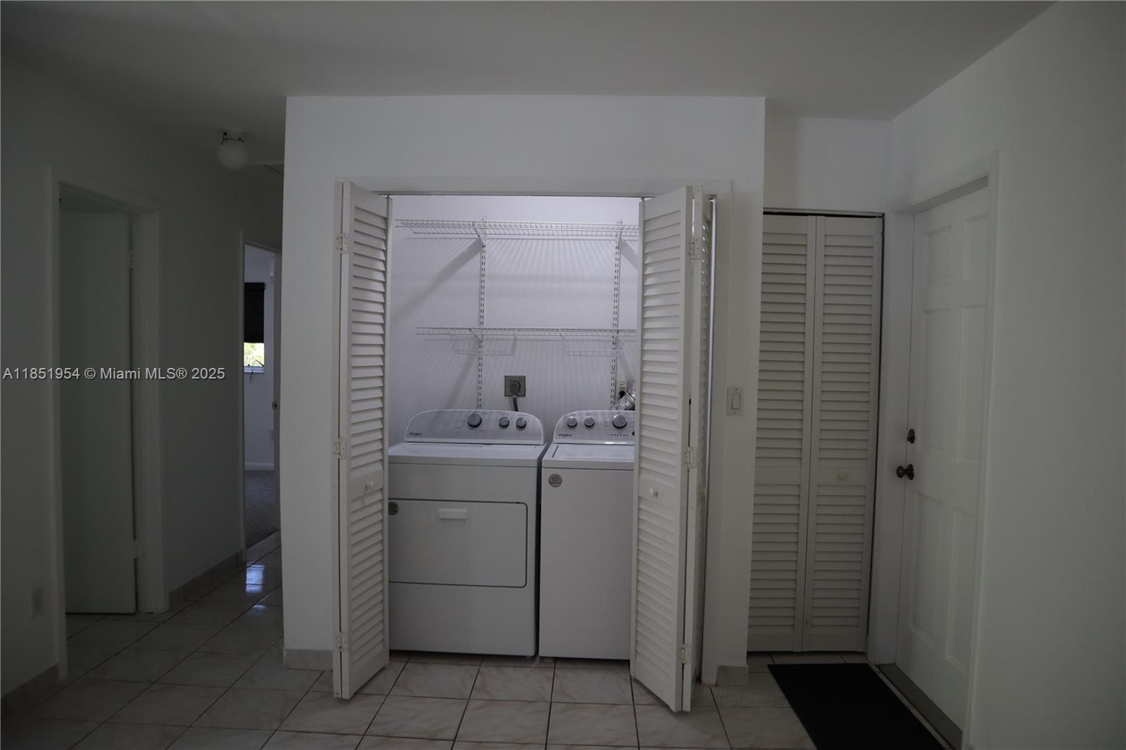 18531 Southwest 268th Street, Unit 18531 Homestead, FL 33031 - Photo 14 of 18 a bathroom with a shower toilet and sink
