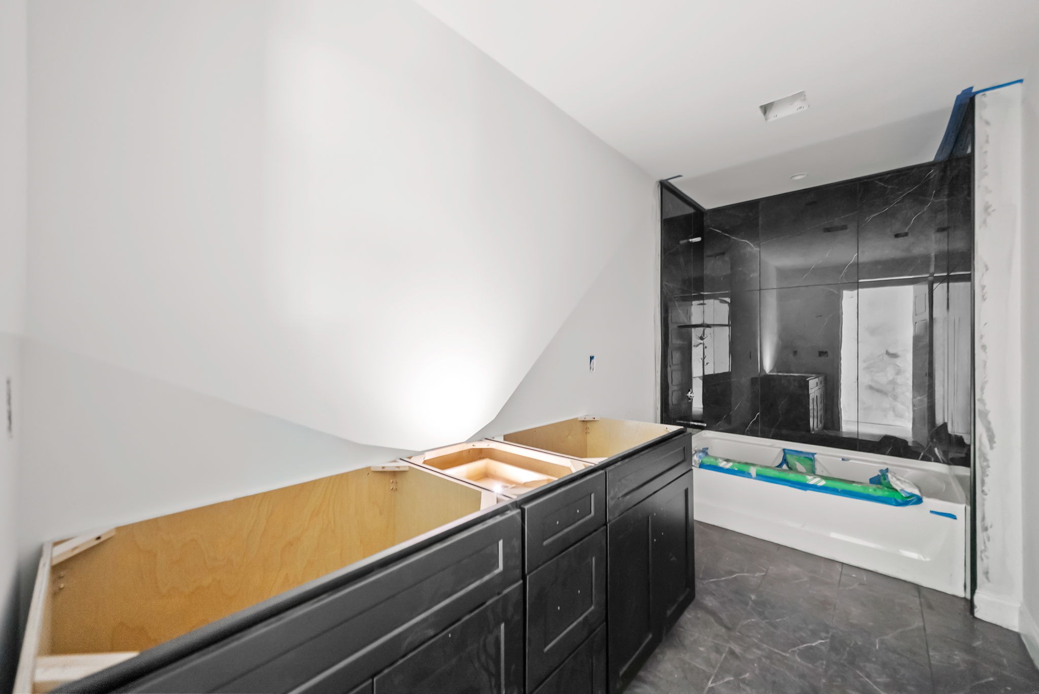 2108 Chivalry Way Clarksville, TN 37040 - Photo 39 of 49 a room with kitchen island and a wooden floor