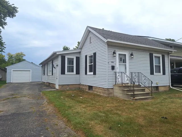 a house view with a garden space