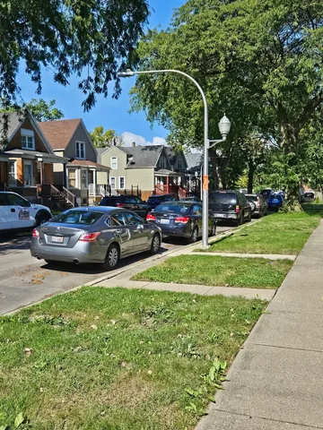 a front view of a building with garden