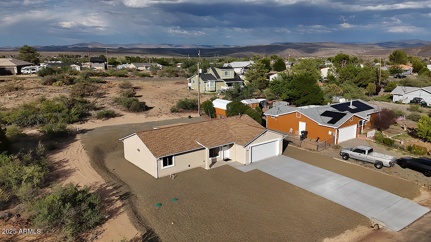 20214 East Mesa Verde Road Mayer, AZ 86333 - Photo 24 of 26 an aerial view of a house with a swimming pool