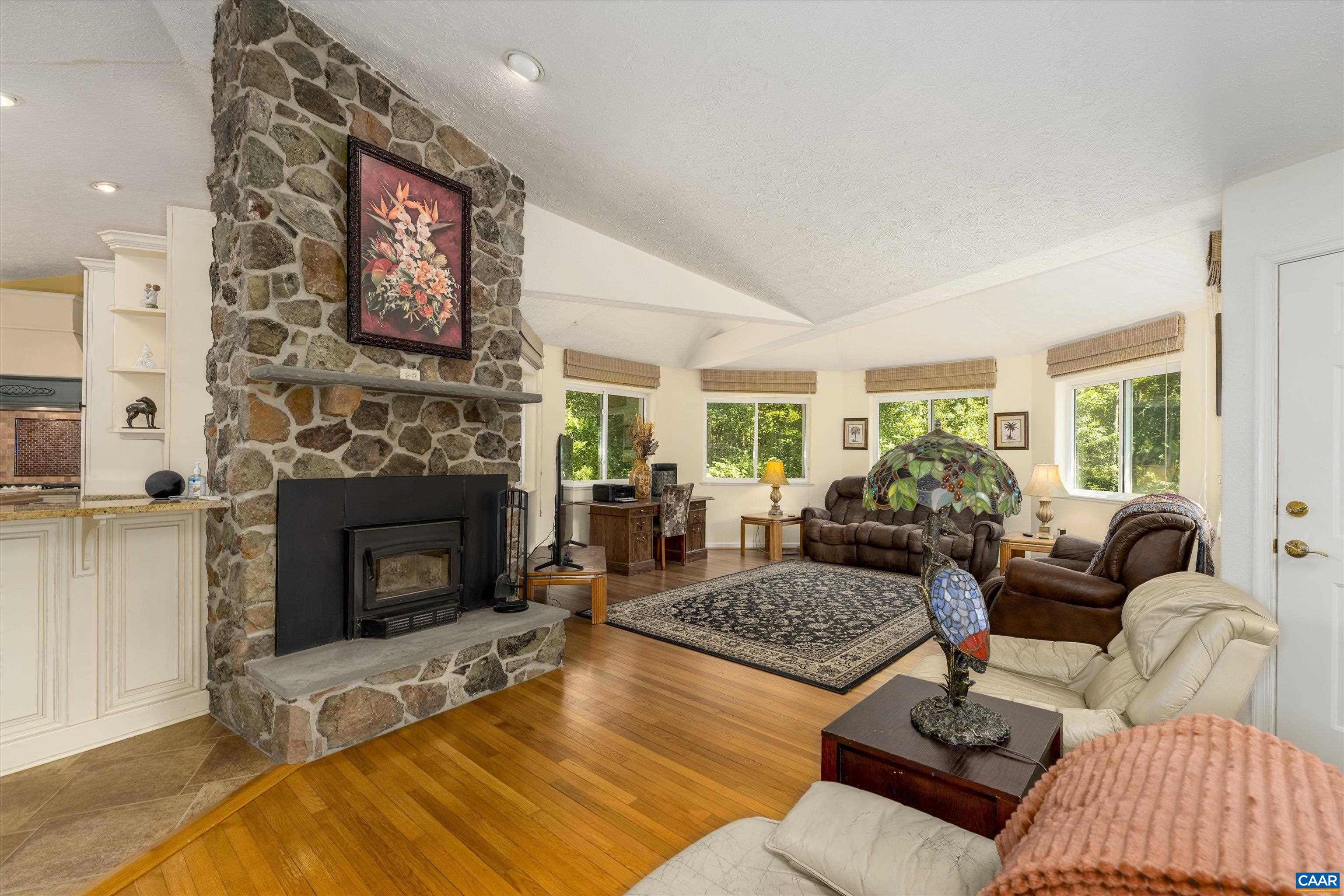 15365 Madison Run Road Gordonsville, VA 22942 - Photo 11 of 38 a living room with furniture and a fireplace