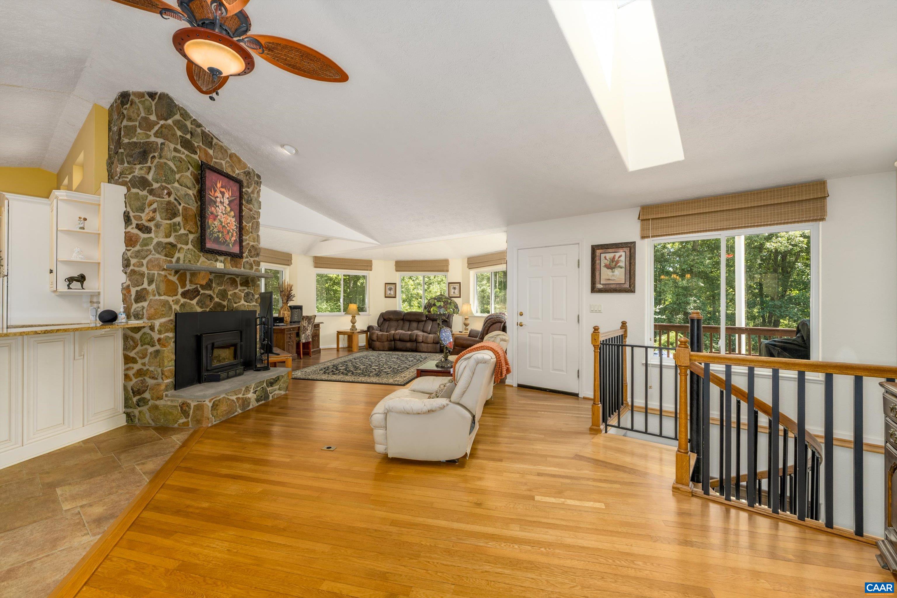 15365 Madison Run Road Gordonsville, VA 22942 - Photo 14 of 38 a living room with furniture and a fireplace