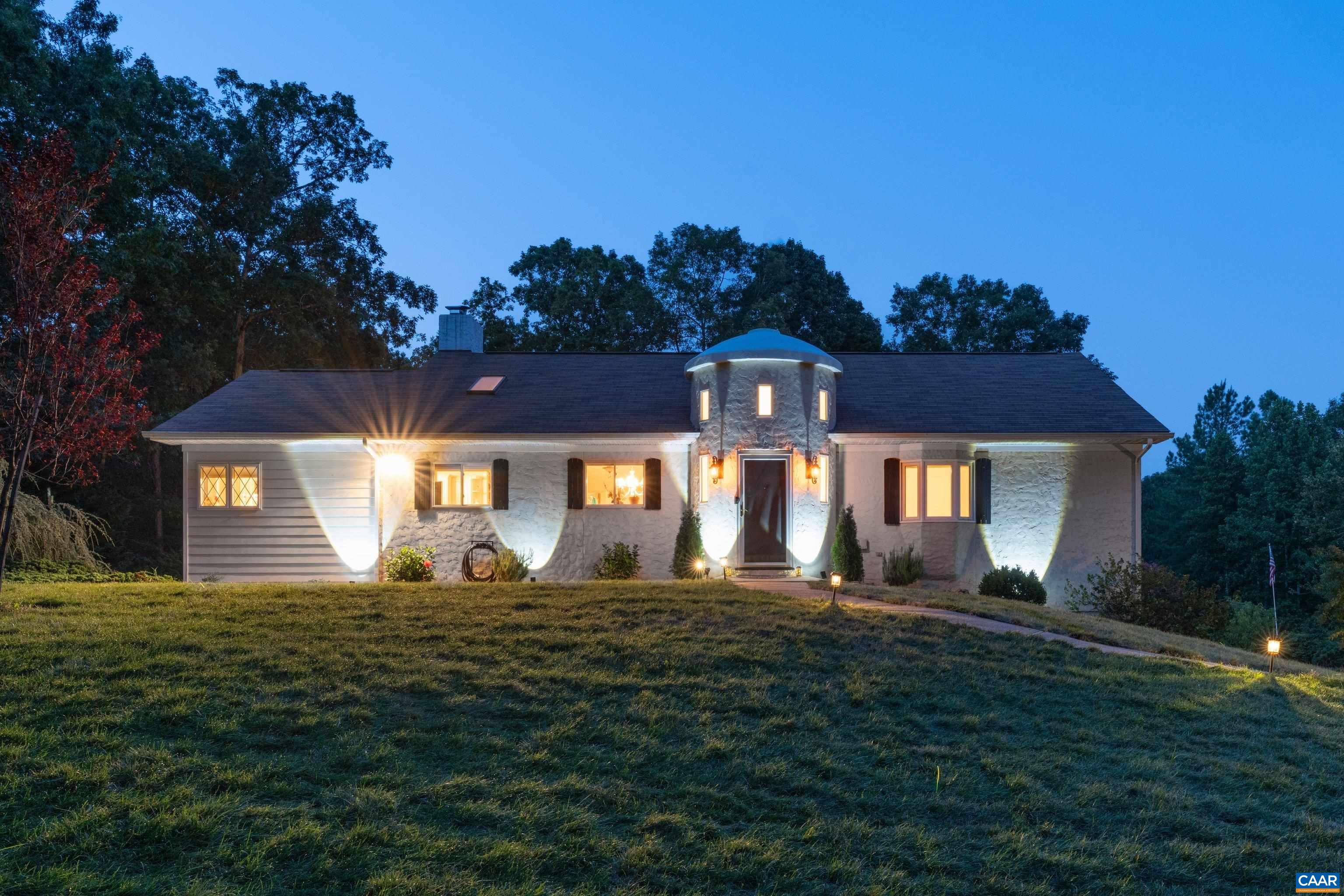 15365 Madison Run Road Gordonsville, VA 22942 - Photo 2 of 38 a front view of a house with a yard