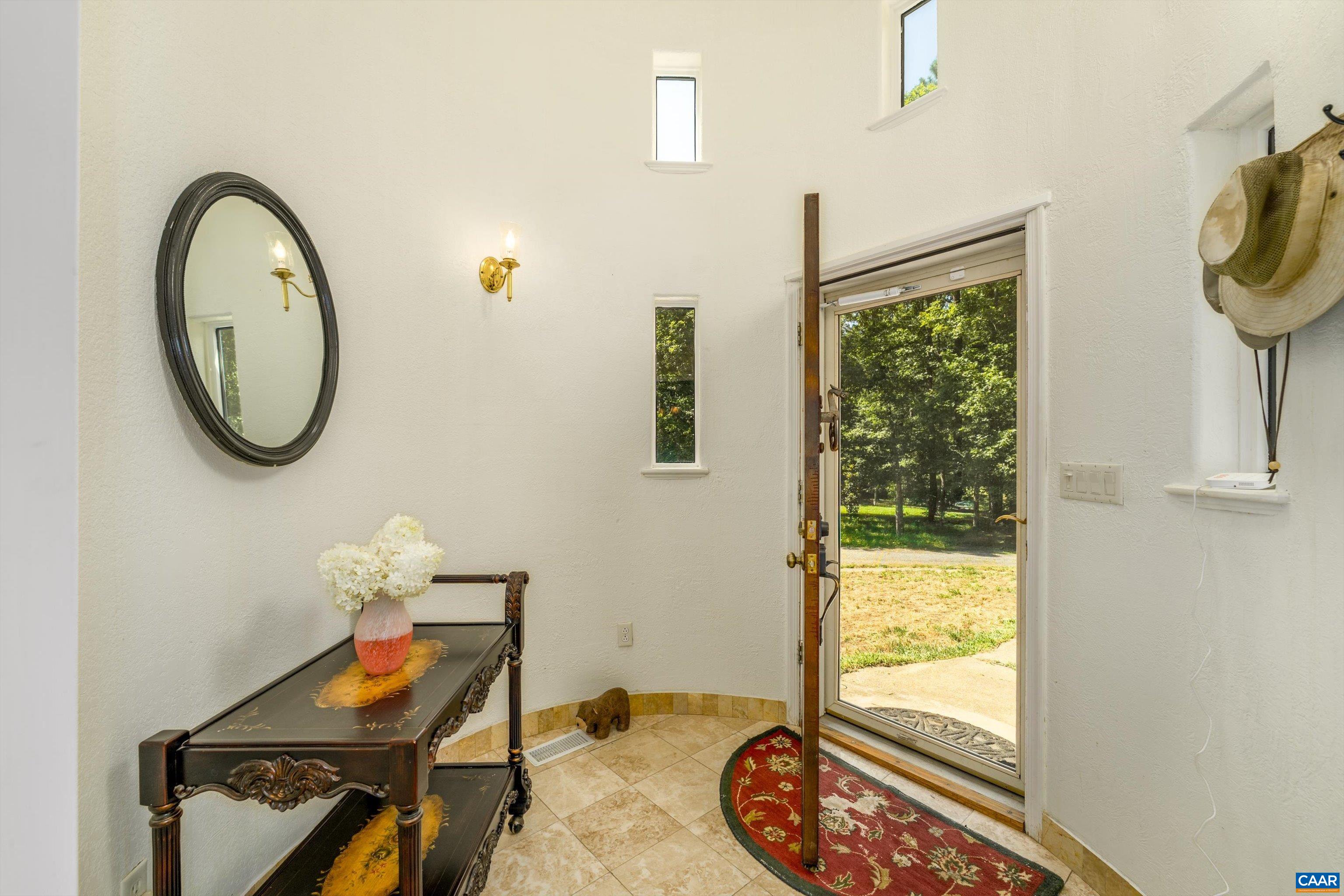 15365 Madison Run Road Gordonsville, VA 22942 - Photo 3 of 38 a room with furniture and a window