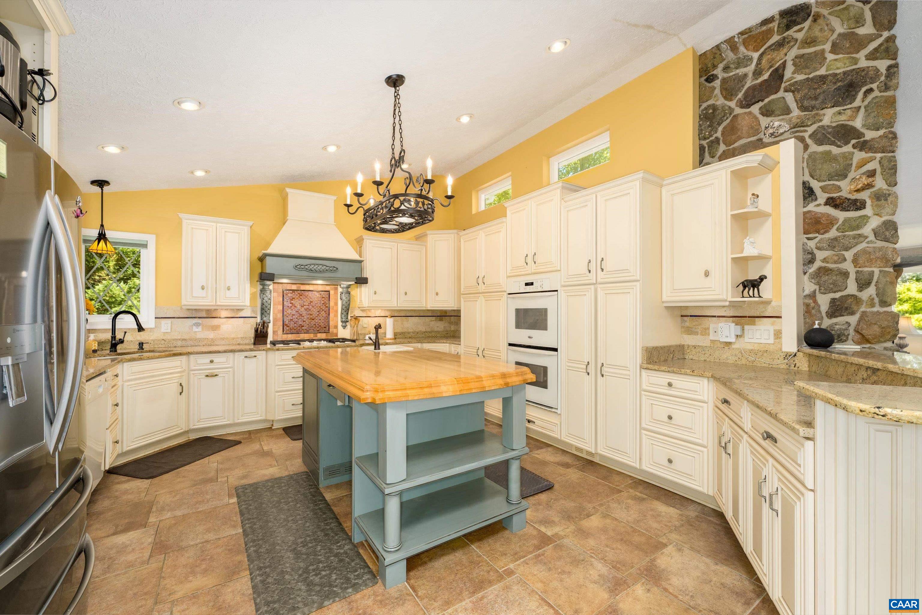 15365 Madison Run Road Gordonsville, VA 22942 - Photo 6 of 38 a large white kitchen with a large window