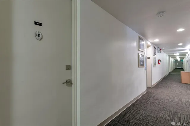 a view of a hallway with closet