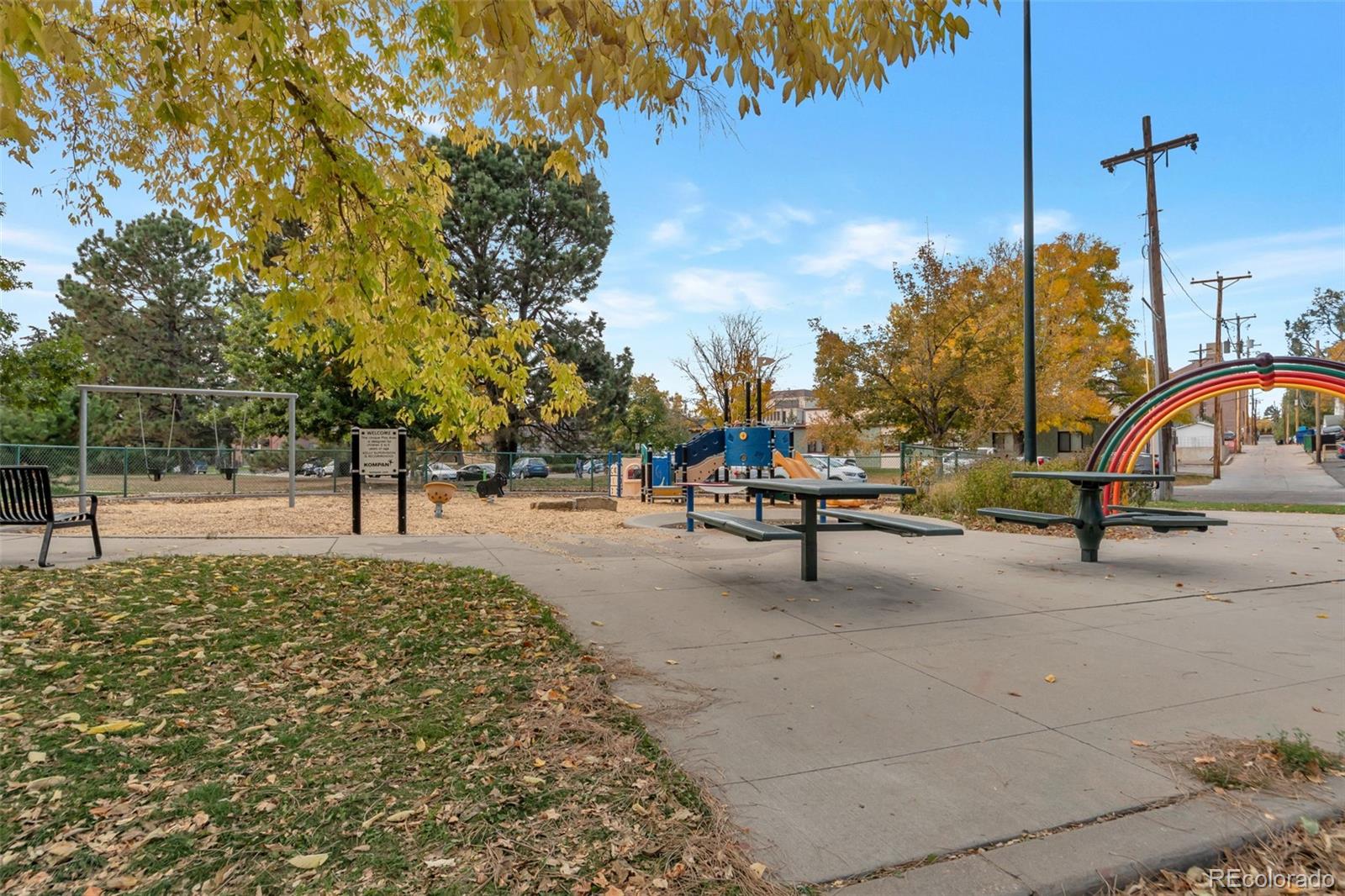 2500 South York Street, Unit 107 Denver, CO 80210 - Photo 18 of 21 a view of a park with swings