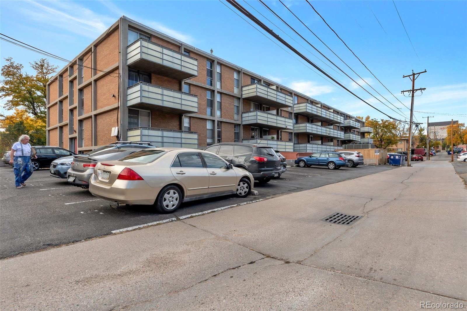 2500 South York Street, Unit 107 Denver, CO 80210 - Photo 21 of 21 a view of a cars parked in front of a building