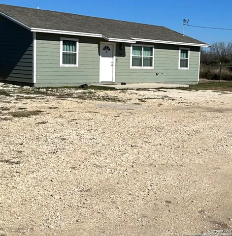 a view of front of a house with a window