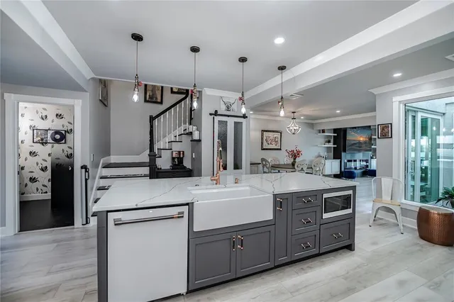 a kitchen with a table and chairs in it