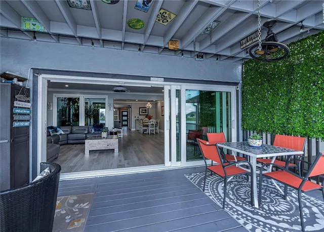 a view of a porch with furniture