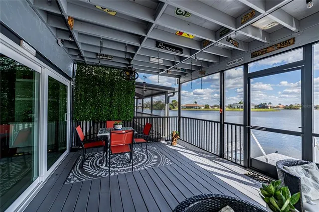 a view of a hallway with workspace and entryway