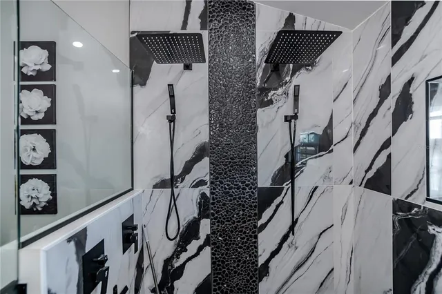 a utility room with sink dryer and washer