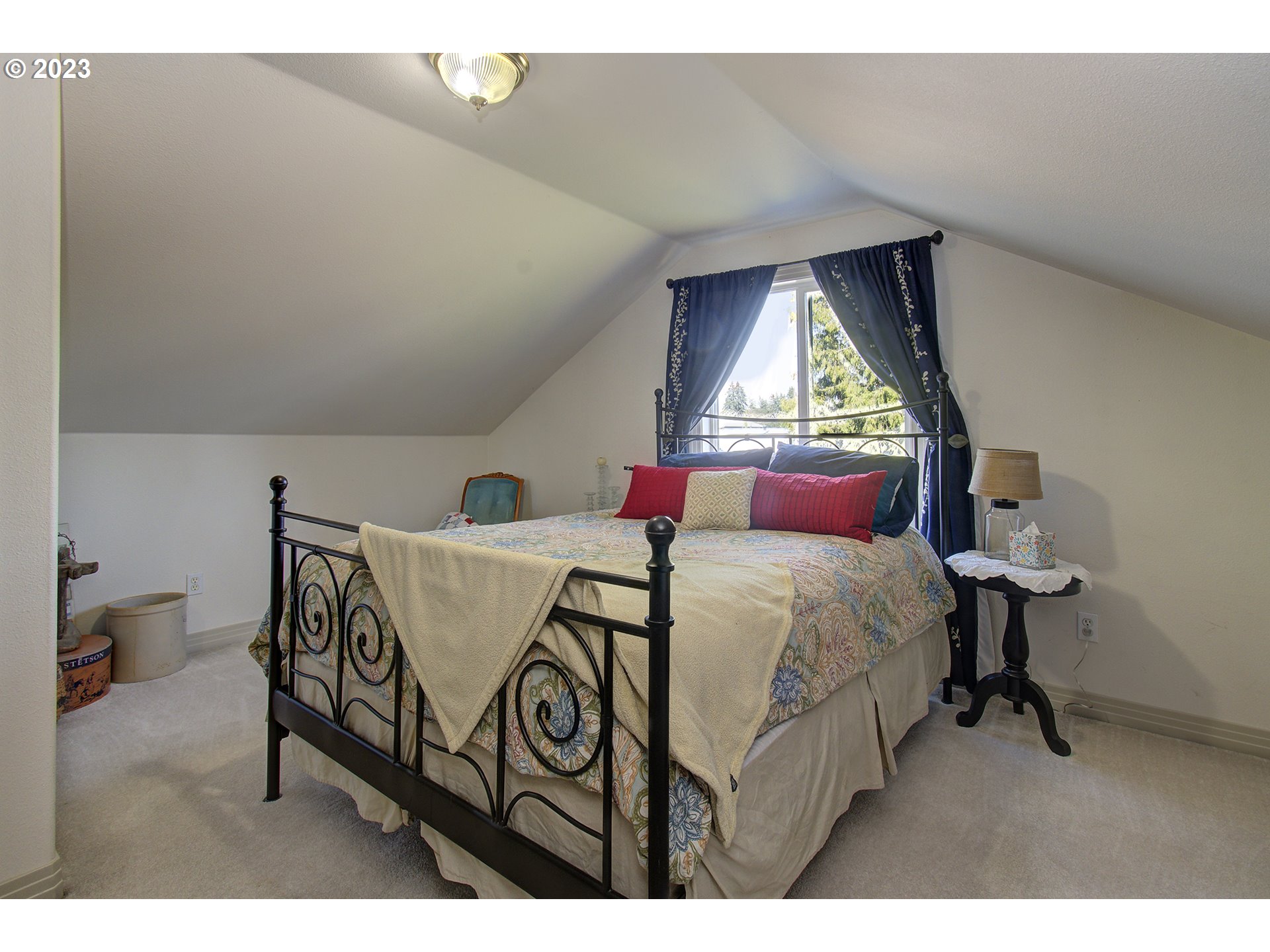 4702 Northeast 199th Street Ridgefield, WA 98642 - Photo 11 of 32 a bed room with a bed and a window