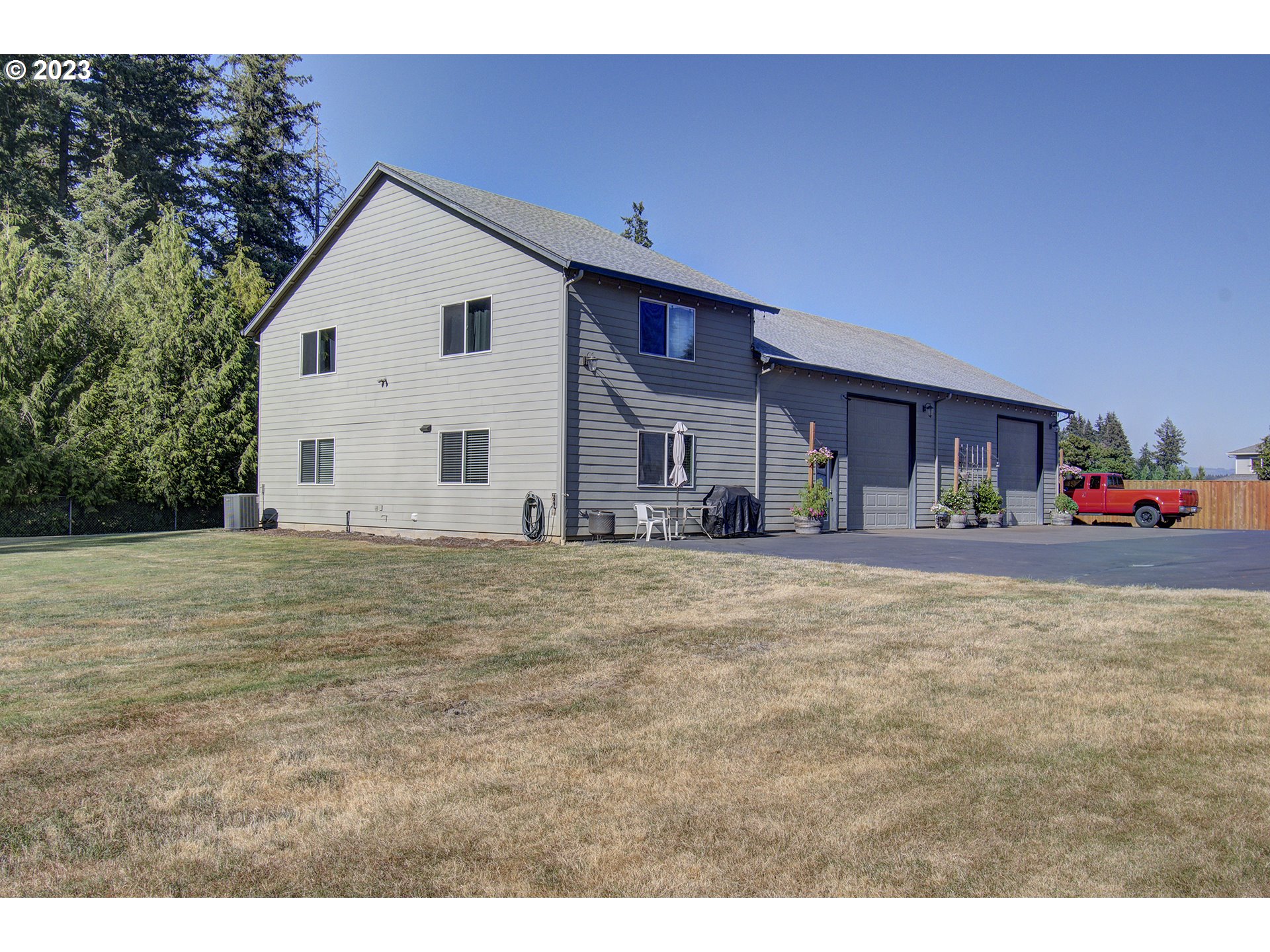 4702 Northeast 199th Street Ridgefield, WA 98642 - Photo 17 of 32 a view of house with outdoor space