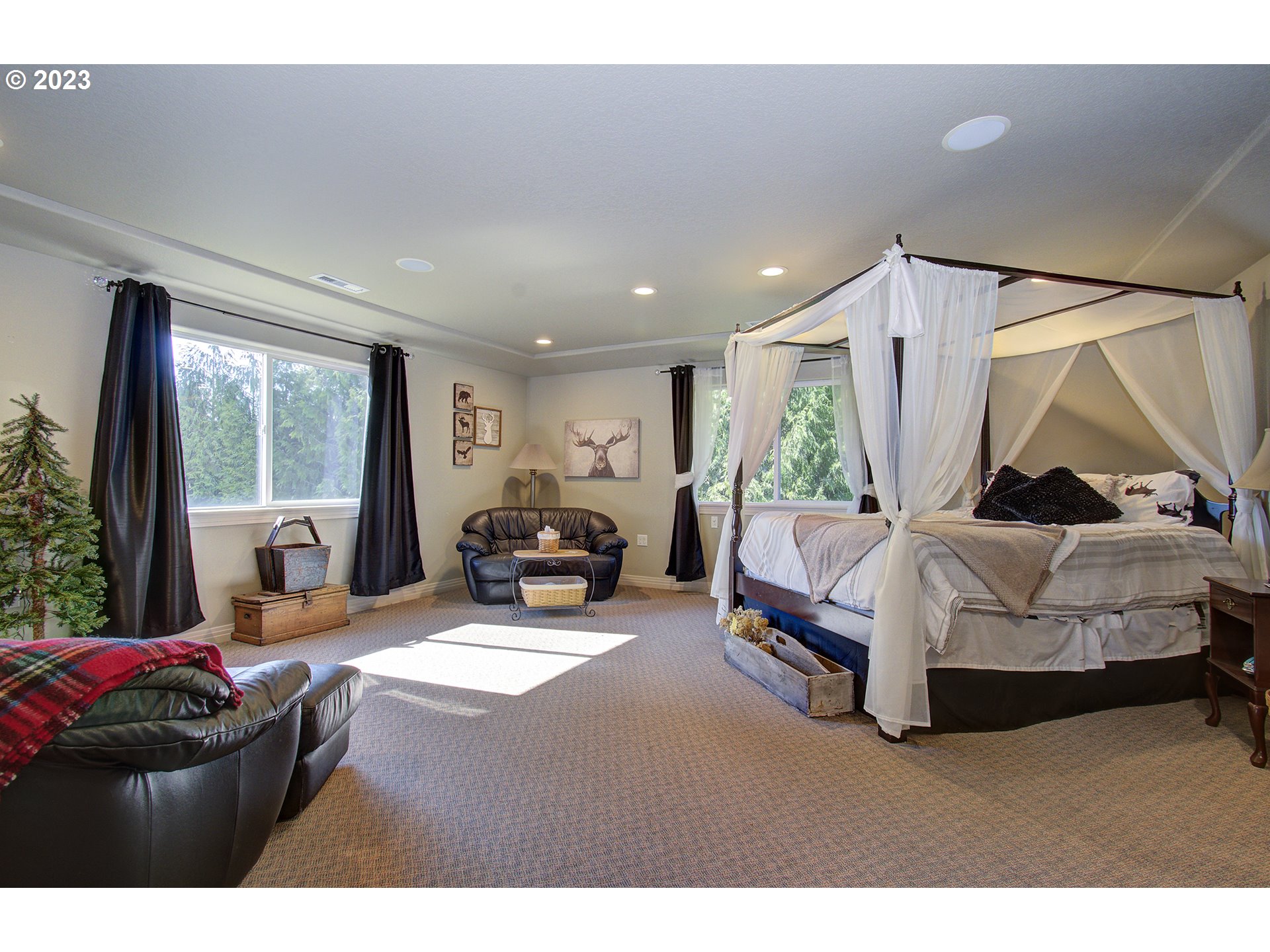 4702 Northeast 199th Street Ridgefield, WA 98642 - Photo 22 of 32 a living room with furniture and a large window