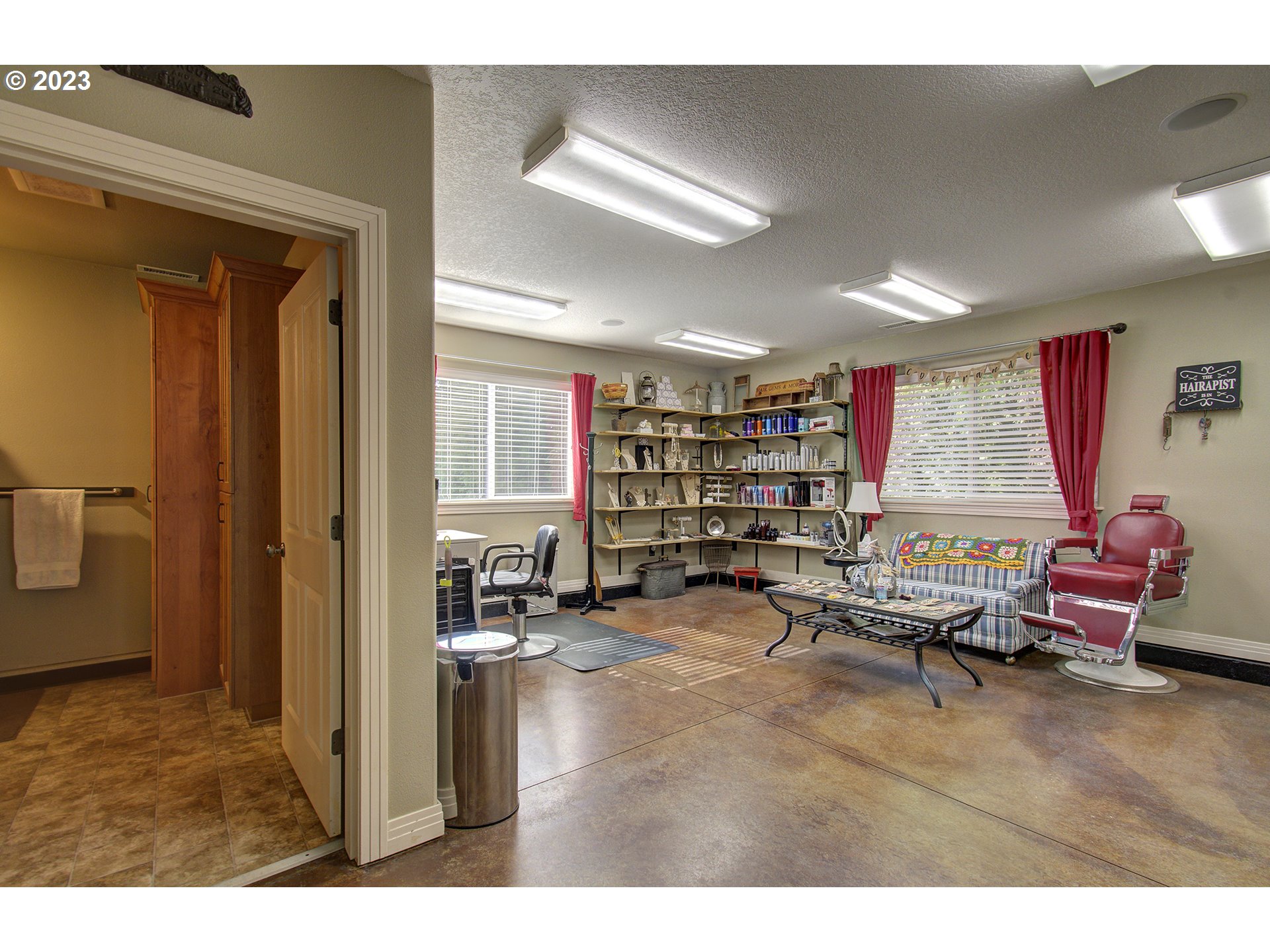 4702 Northeast 199th Street Ridgefield, WA 98642 - Photo 25 of 32 a living room with furniture and a wooden floor