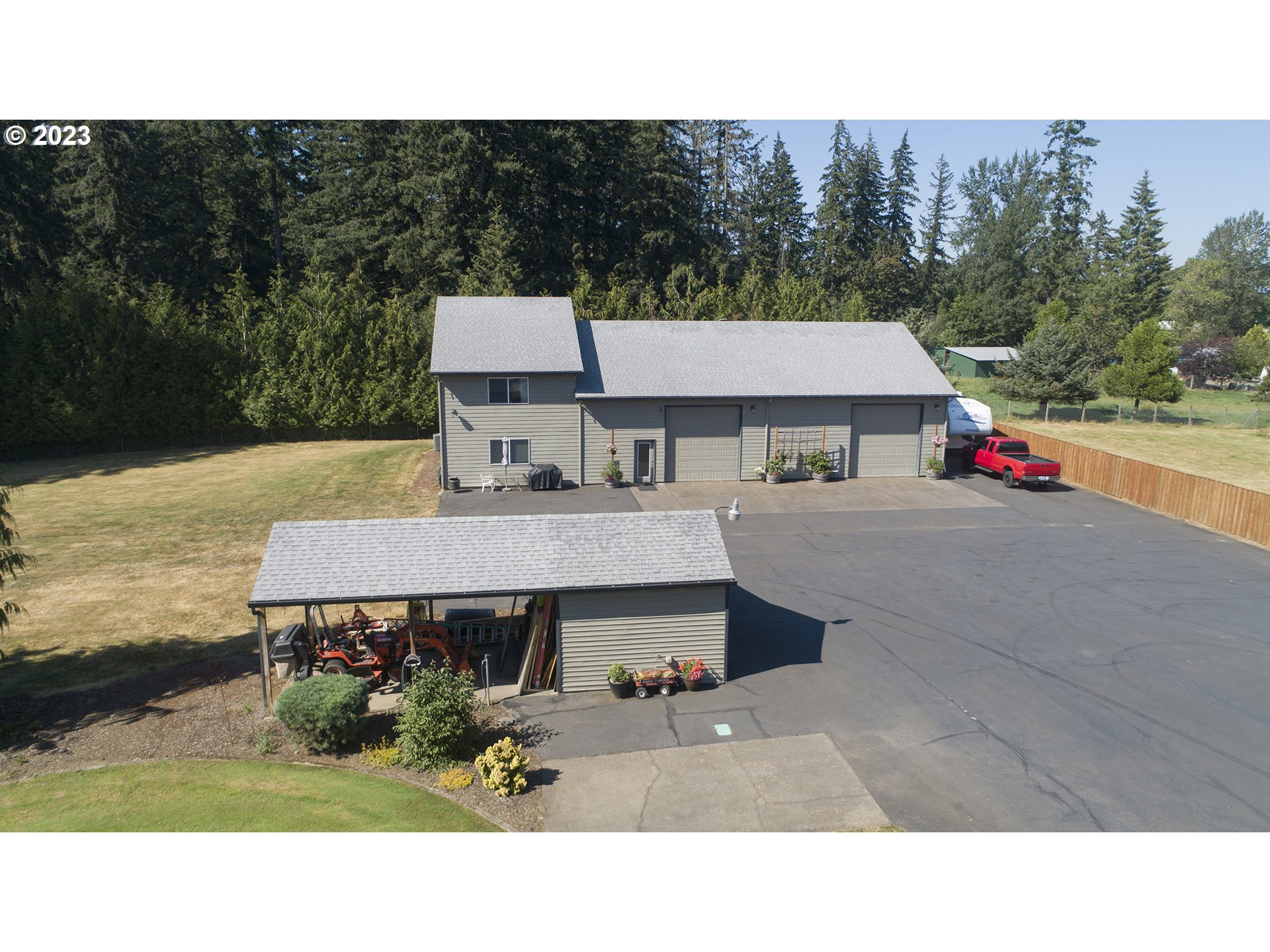 4702 Northeast 199th Street Ridgefield, WA 98642 - Photo 28 of 32 a picture of a park that has a tree on the side of it