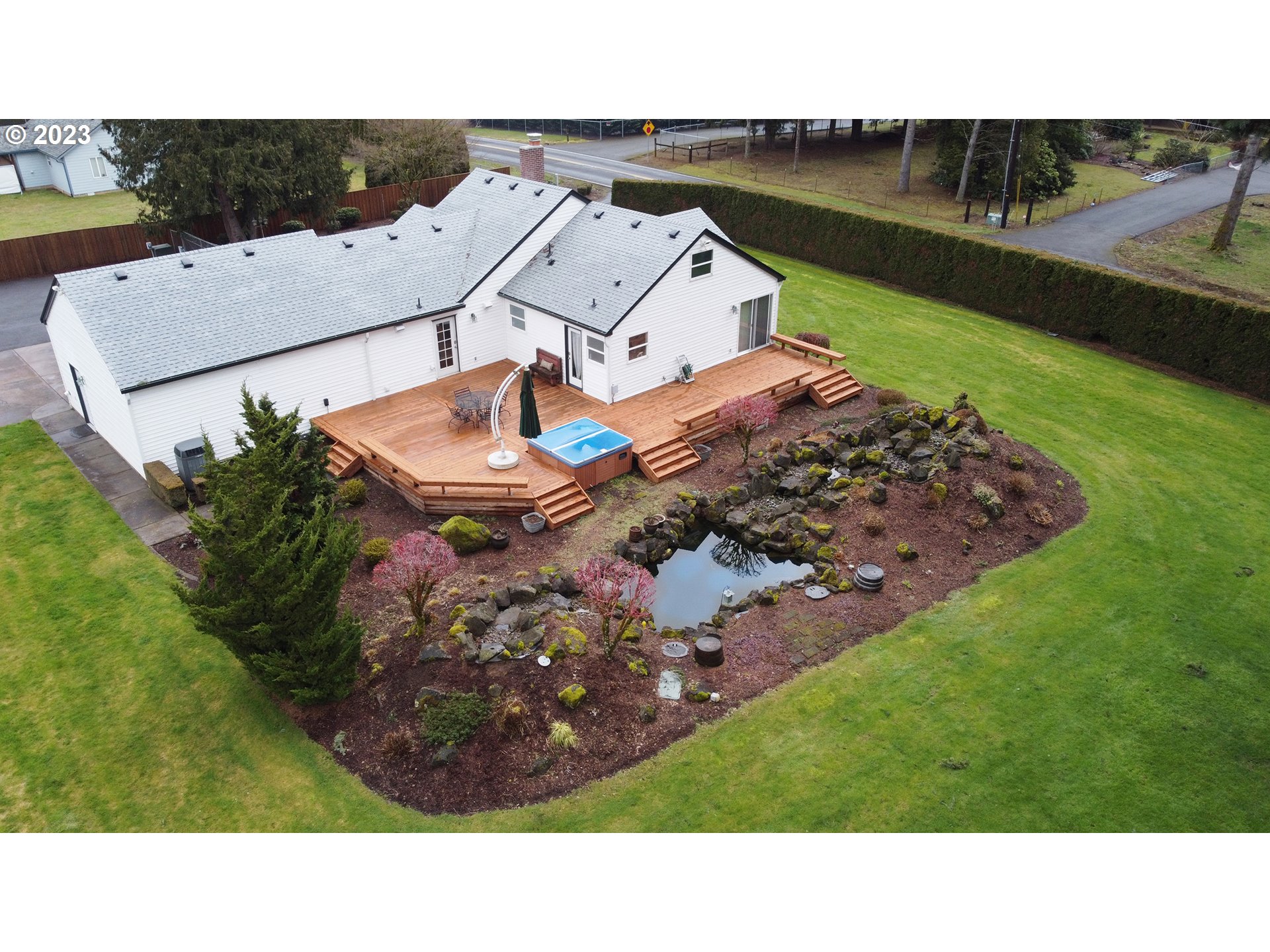 4702 Northeast 199th Street Ridgefield, WA 98642 - Photo 30 of 32 an aerial view of a house with a garden