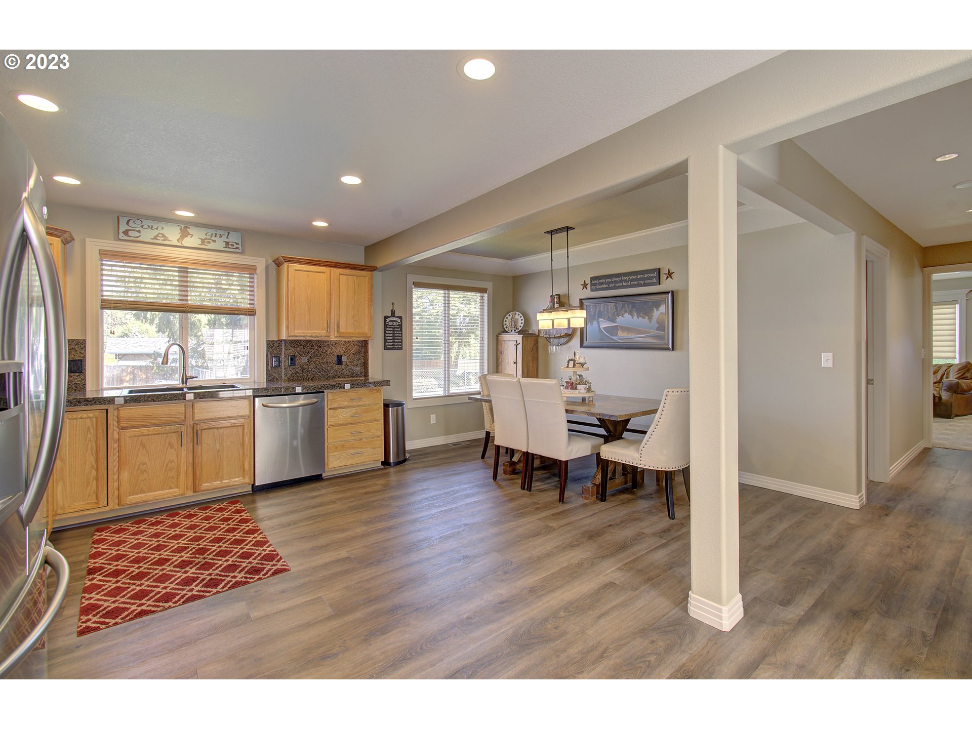 4702 Northeast 199th Street Ridgefield, WA 98642 - Photo 7 of 32 a kitchen with a sink appliances and cabinets