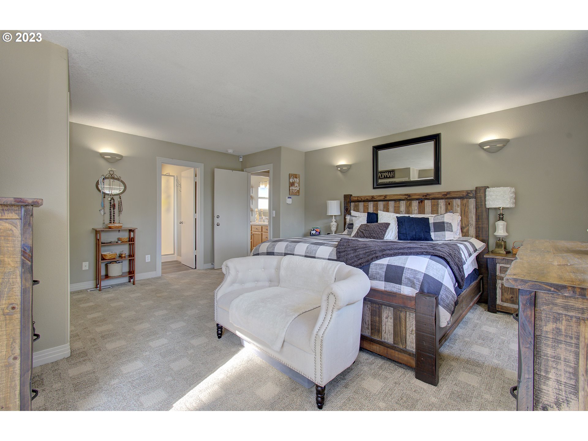 4702 Northeast 199th Street Ridgefield, WA 98642 - Photo 9 of 32 a bedroom with furniture and a bed