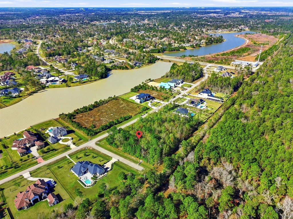 27560 South Lazy Meadow Way Spring, TX 77386 - Photo 15 of 42 an aerial view of residential houses with outdoor space