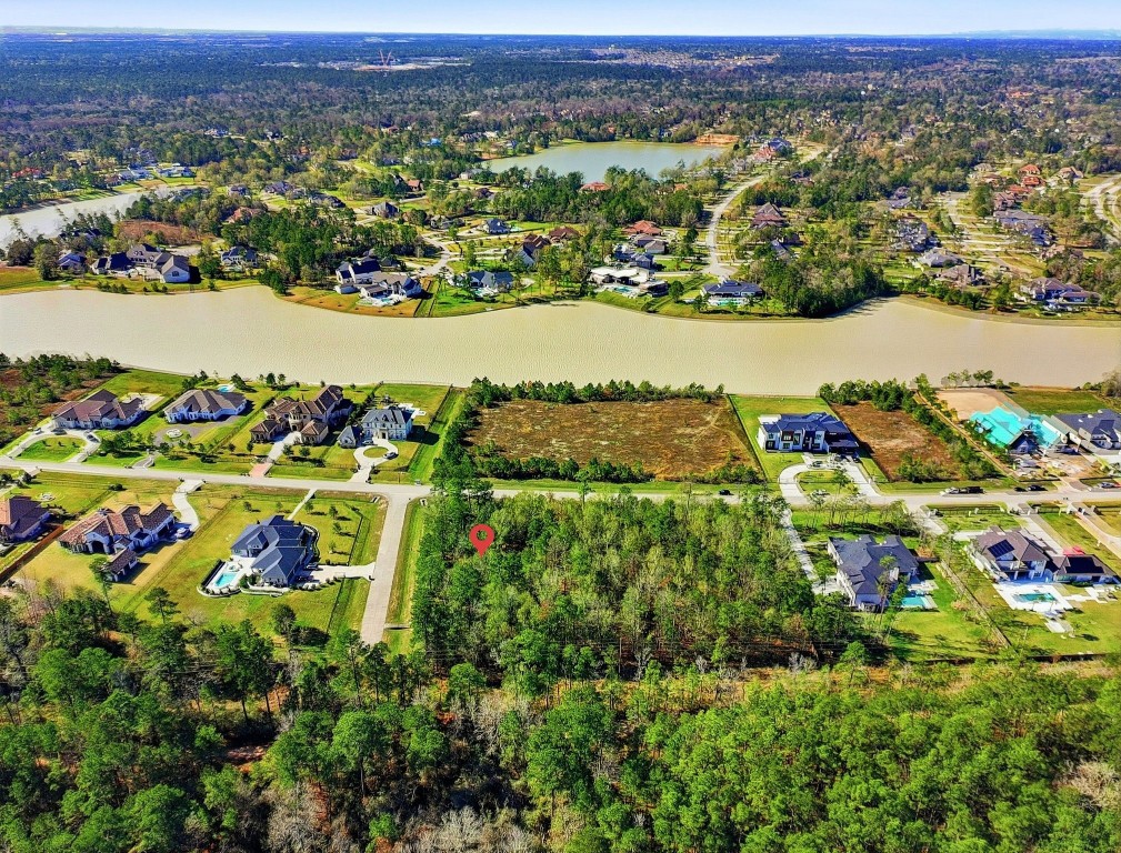 27560 South Lazy Meadow Way Spring, TX 77386 - Photo 16 of 42 an aerial view of residential houses with outdoor space and trees