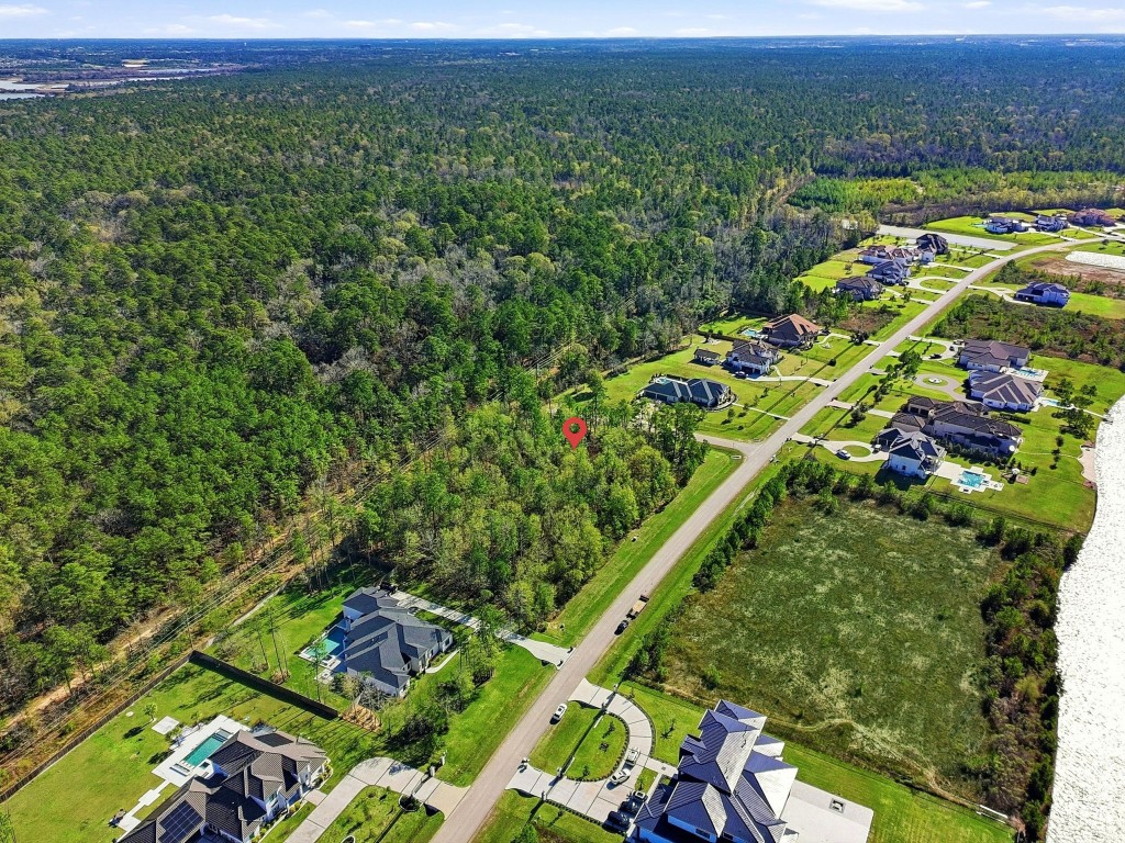 27560 South Lazy Meadow Way Spring, TX 77386 - Photo 18 of 42 an aerial view of a yard