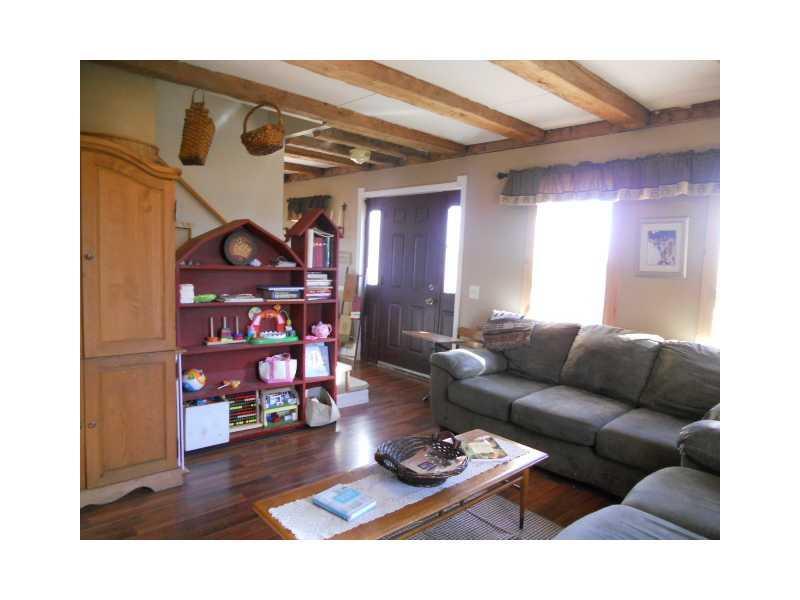 133 Hunter Road Unity, ME 04988 - Photo 11 of 34 Living Room. farmhouse book shelf...