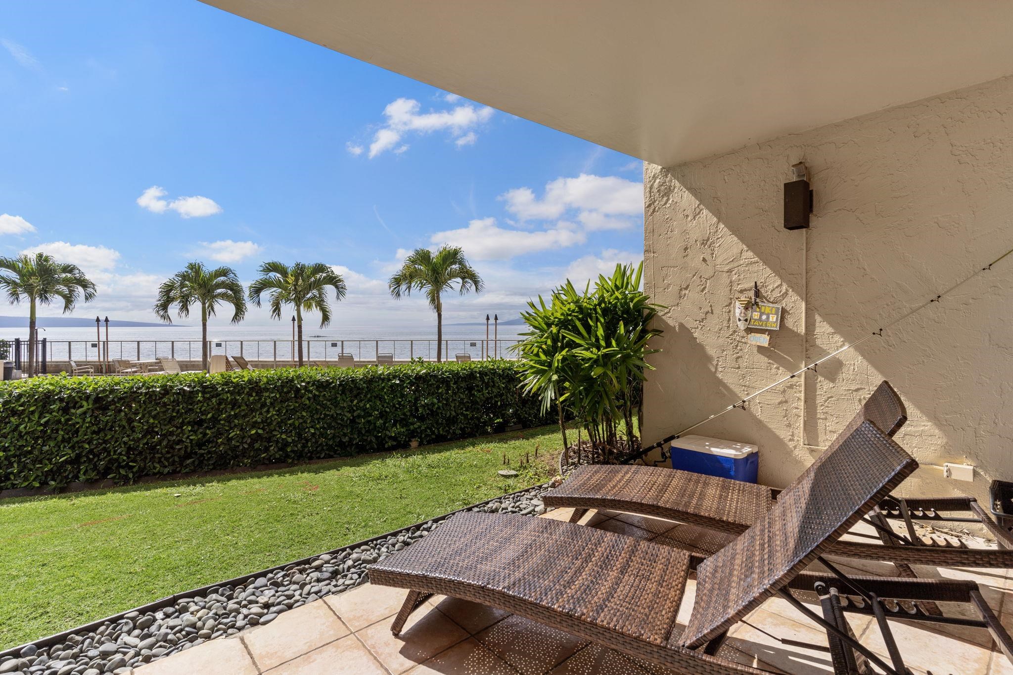 4401 Lower Honoapiilani Road, Unit A101 Lahaina, HI 96761 - Photo 17 of 37 a view of a backyard with plants and outdoor seating