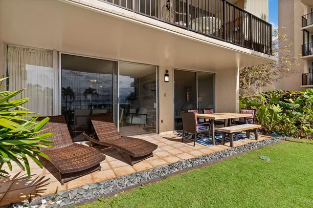 a view of a two chair in the patio