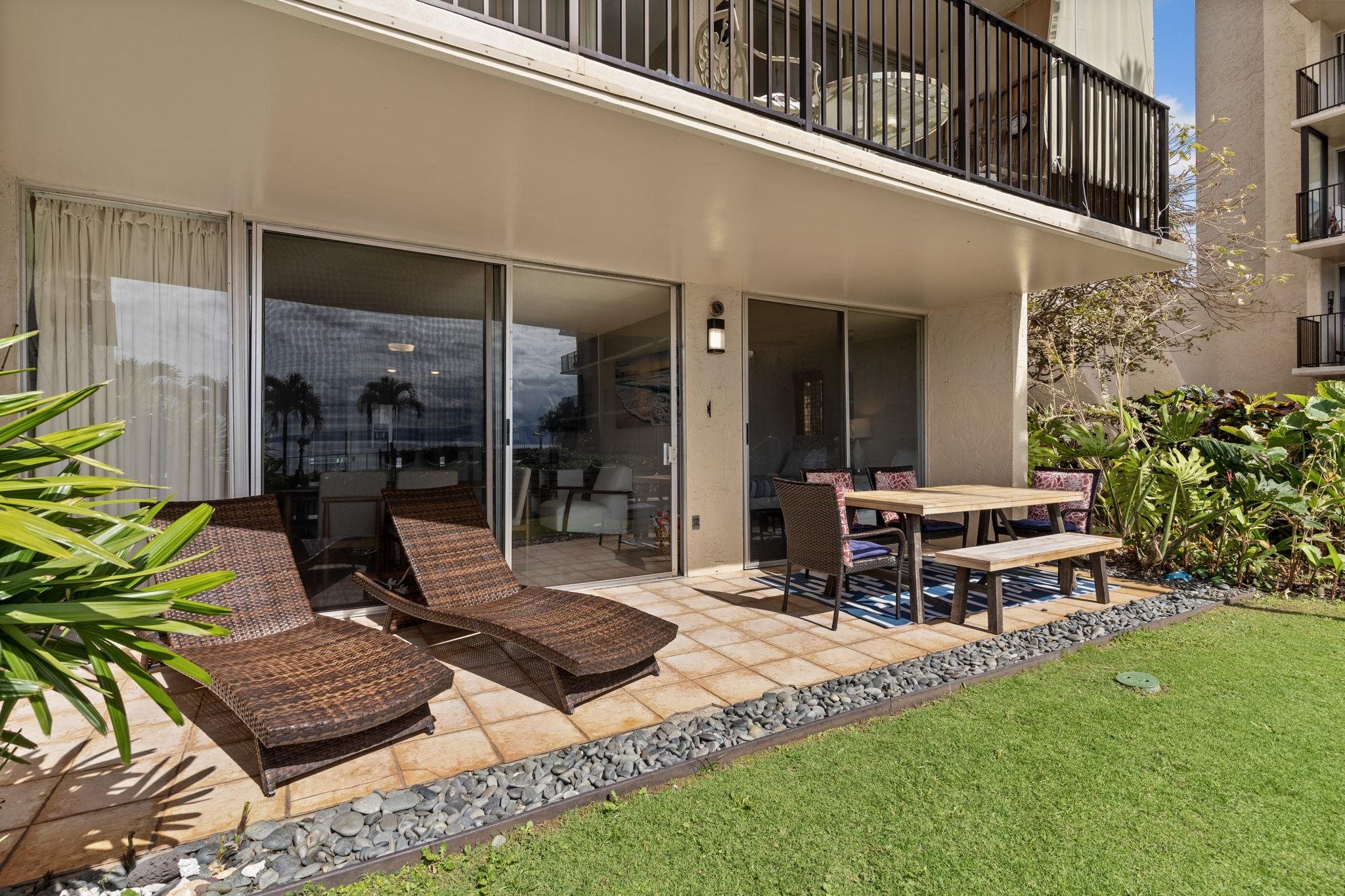 4401 Lower Honoapiilani Road, Unit A101 Lahaina, HI 96761 - Photo 18 of 37 a view of a two chair in the patio