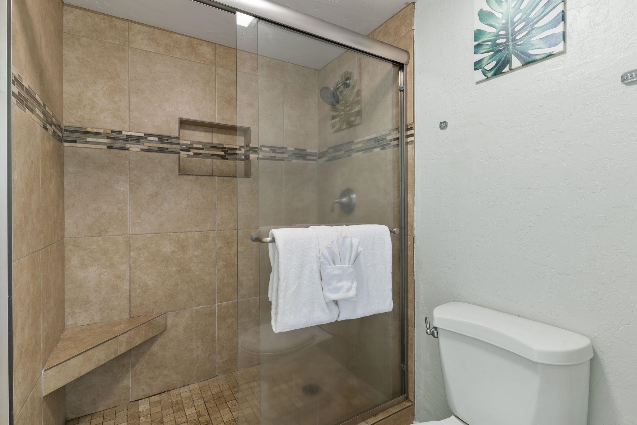 4401 Lower Honoapiilani Road, Unit A101 Lahaina, HI 96761 - Photo 28 of 37 a bathroom with a toilet and a shower