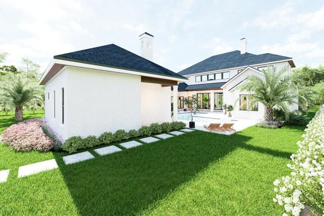 a front view of house with garden