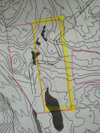 a bathroom with a toilet and a sink