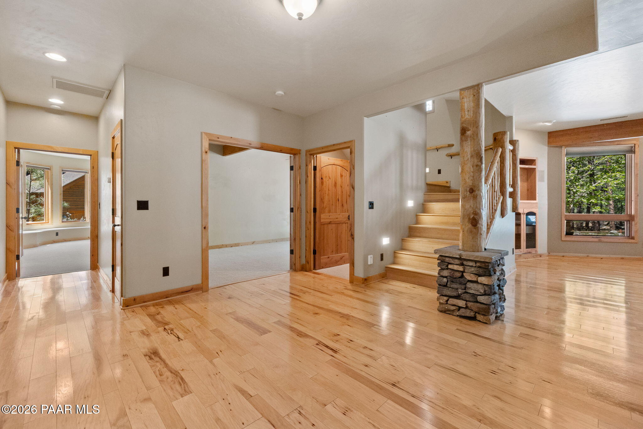5140 East Charcoal Kiln Road Prescott, AZ 86303 - Photo 65 of 140 a view of empty room with wooden floor and windows