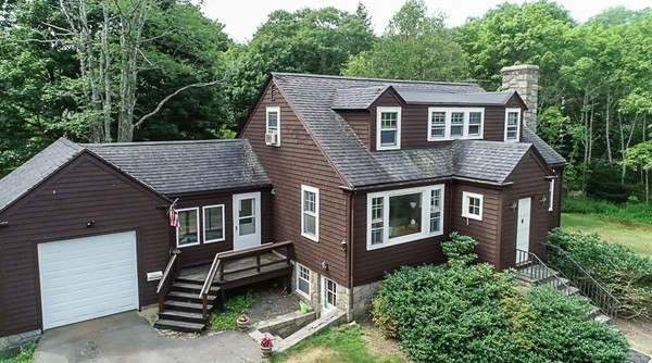 31 Decatur Street Gloucester, MA 01930 - Photo 1 of 17 an aerial view of a house with a yard