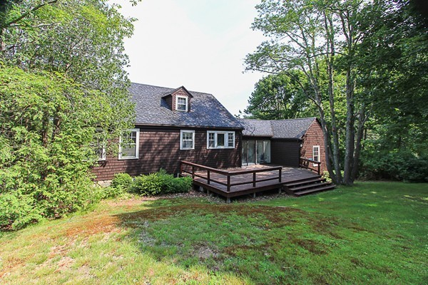 31 Decatur Street Gloucester, MA 01930 - Photo 11 of 17 a front view of a house with garden