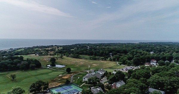 31 Decatur Street Gloucester, MA 01930 - Photo 13 of 17 a view of a green field with lots of bushes