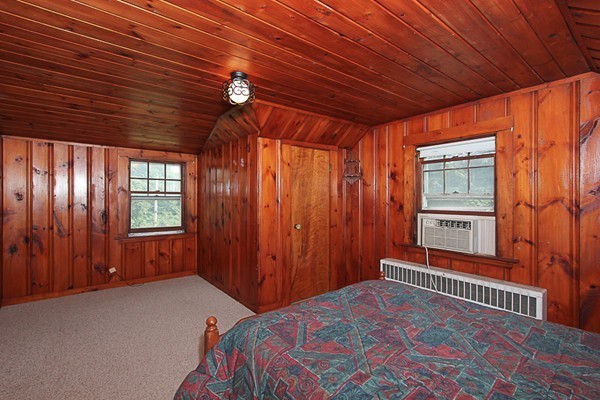 31 Decatur Street Gloucester, MA 01930 - Photo 8 of 17 a bedroom with bed and a window
