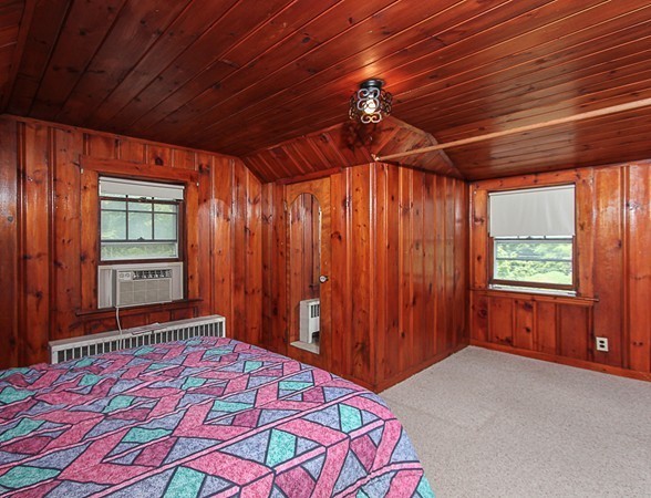 31 Decatur Street Gloucester, MA 01930 - Photo 10 of 17 a bed room with a bed and a window
