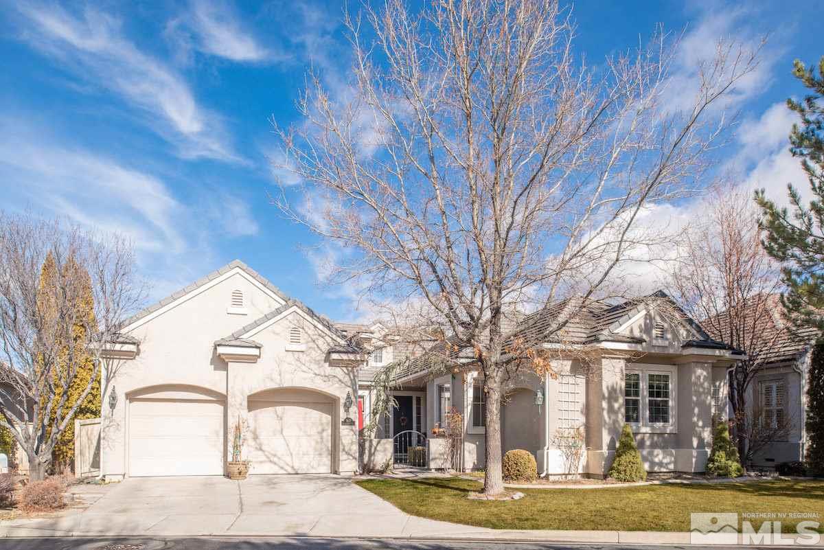 1673 Aspen Creek Road Reno, NV 89519 - Photo 1 of 40 a front view of a house with garden